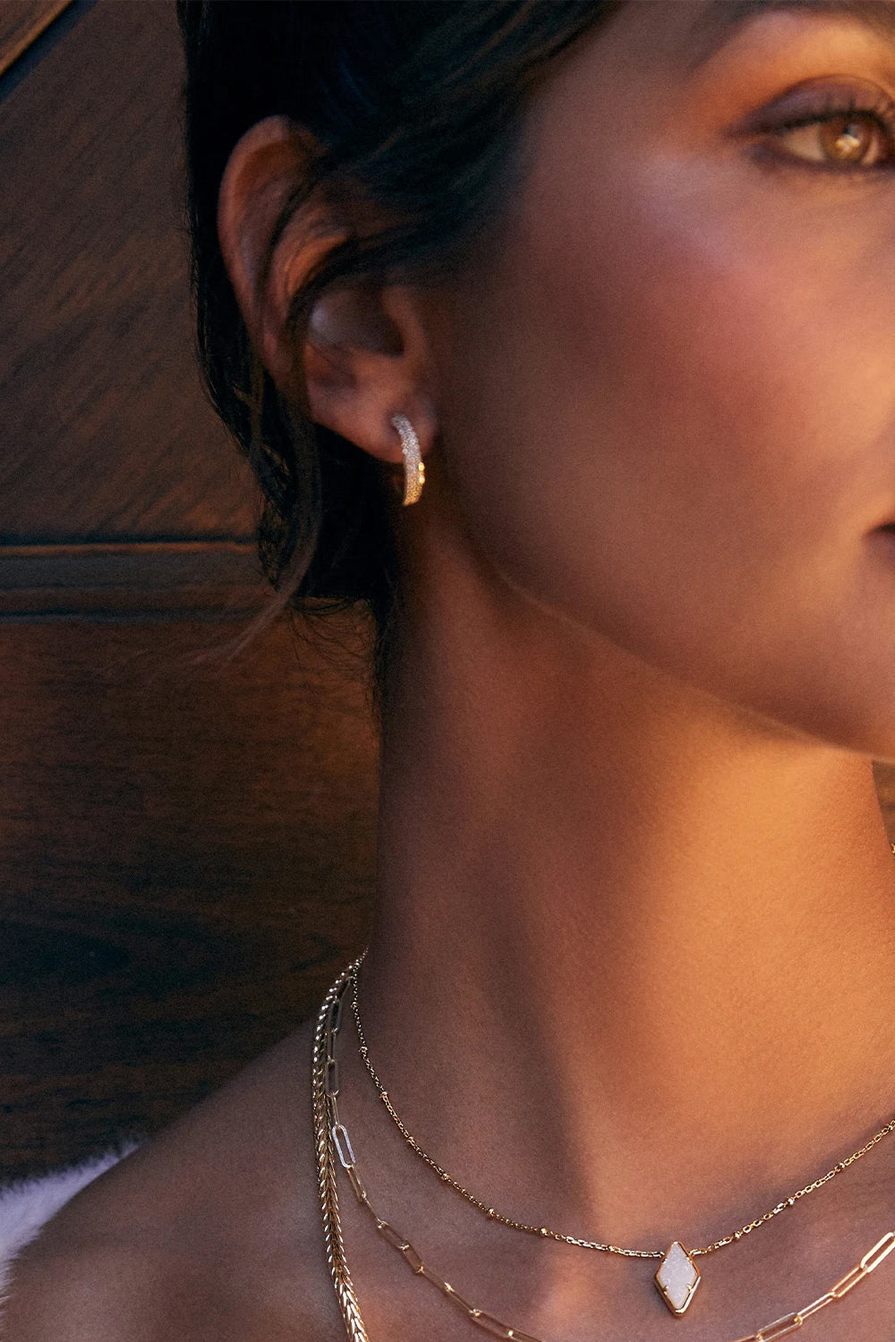 Kendra Scott: Ella Gold Huggie Earrings - White Crystal | Makk Fashions