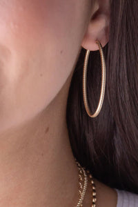 enewton: Oval Gold 2" Textured Hoop Earrings | Makk Fashions