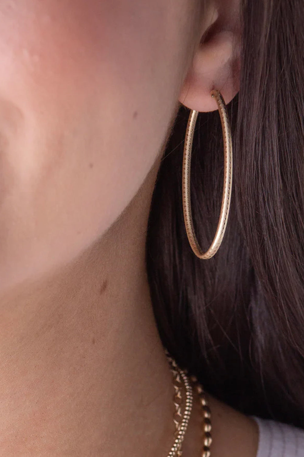 enewton: Oval Gold 2" Textured Hoop Earrings | Makk Fashions