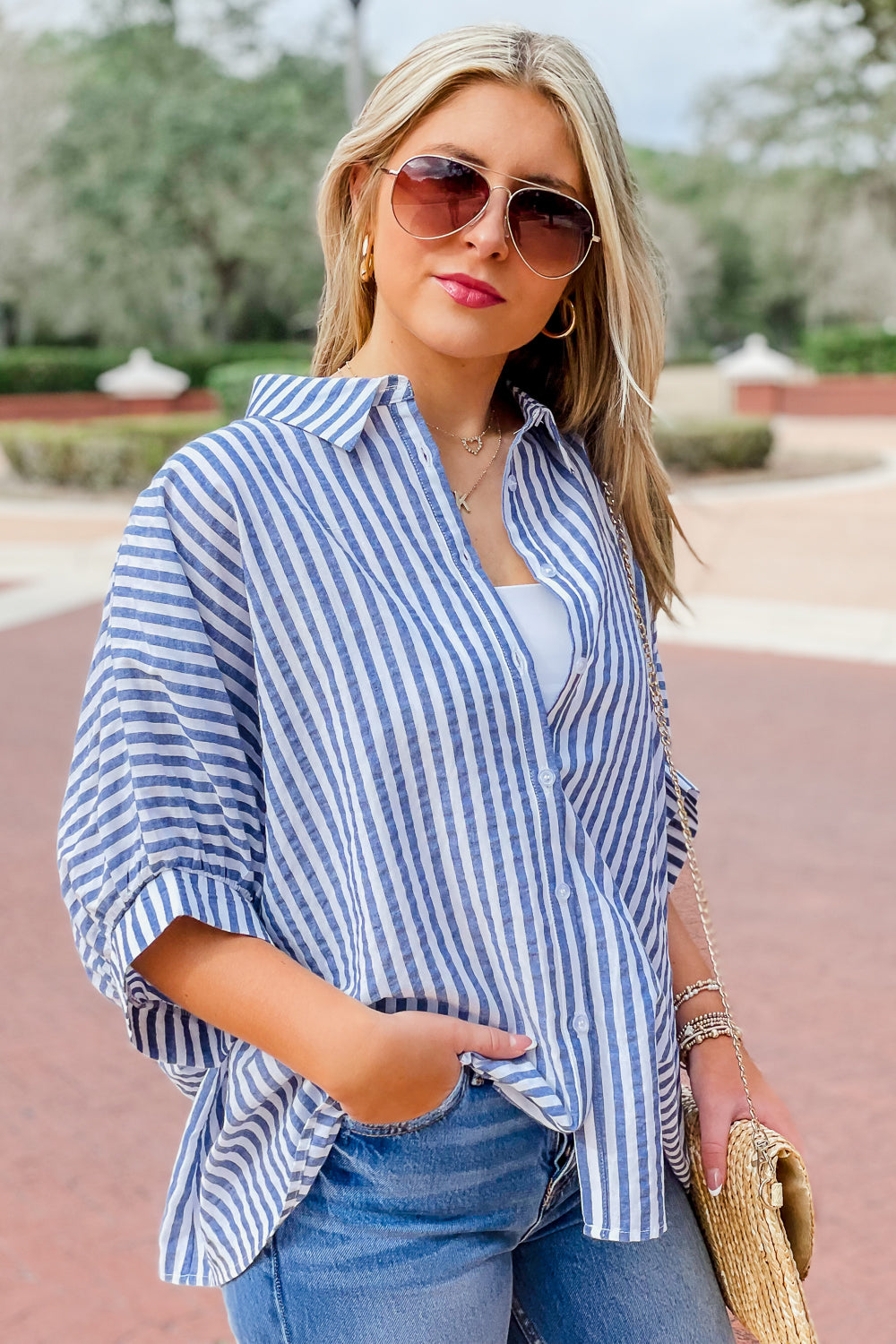 Oversized striped shirt sales outfit