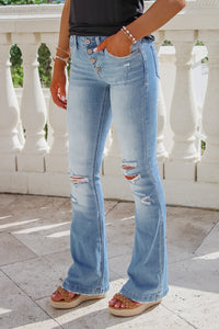 KanCan: Harlowe Mid Rise Distressed Flare Jeans - Medium Wash | Makk Fashions