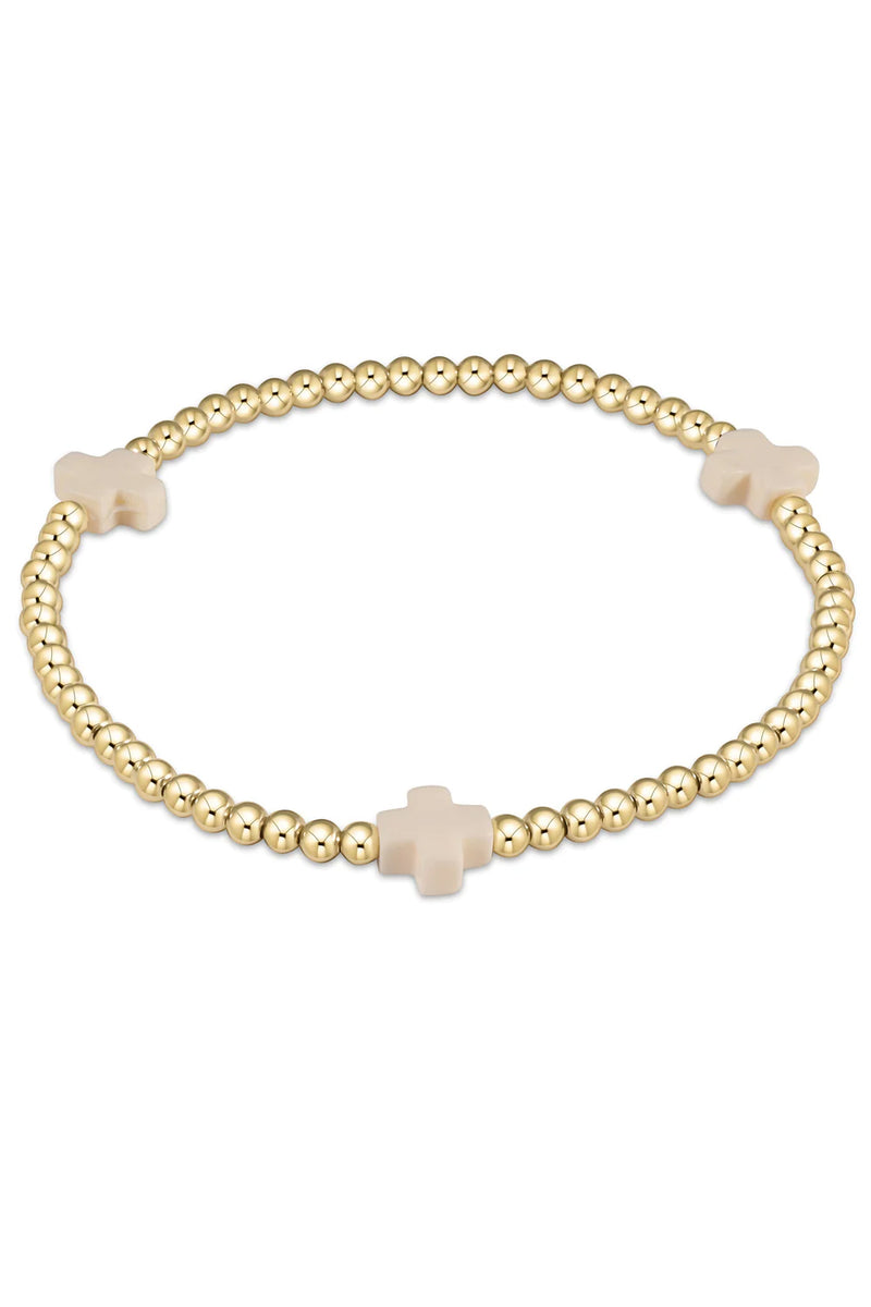 enewton: Signature Cross 3mm Gold Bracelet - Off White | Makk Fashions